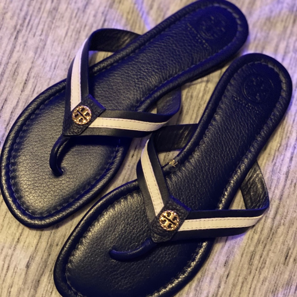 Tory Burch Slides fits like a size 7
